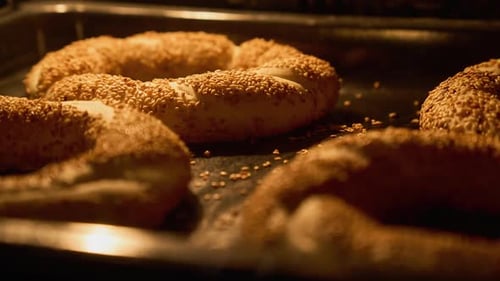 Homemade Bagels with Sesame Baking in Kitchen Oven Popular Turkish Food