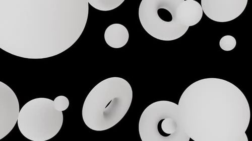 Sphères de mouvement abstraites et formes toriques flottant dans un élégant vide noir