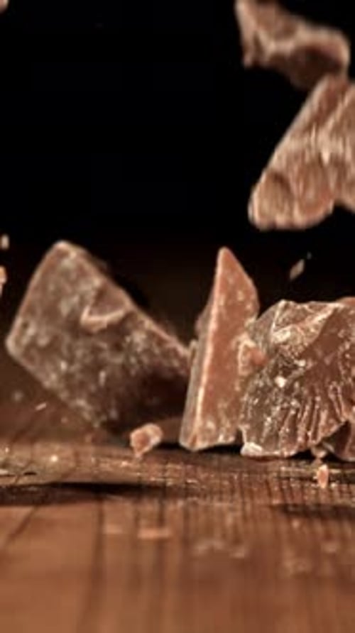 Super Slow Motion Pieces of Dark Milk Chocolate Filmed on a Highspeed Camera at 1000 Fps