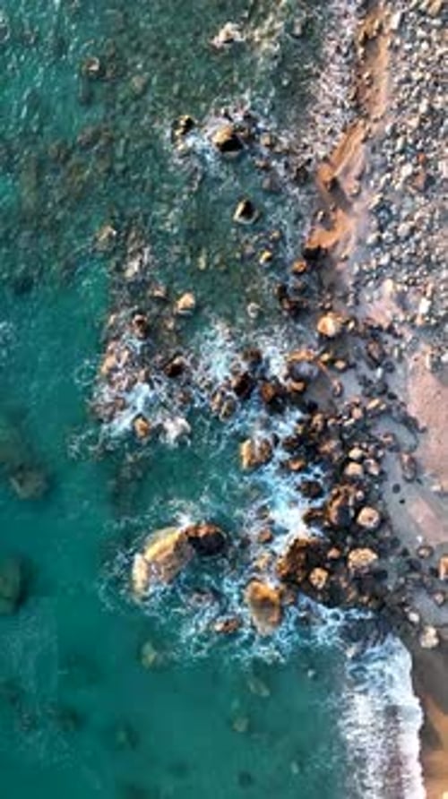 Vertical Video Texture of the Sea and Wild Beach Aerial View