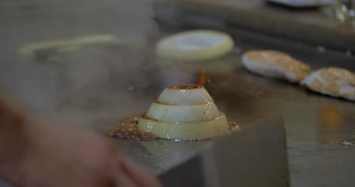 Hibachi Chef Cooking Onion Volcano and Meat, Restaurant Asian
