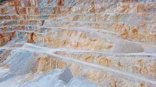 Natural Quarry is Located Near Road Against Backdrop of Rhodope Mountains and Hills with Forests and