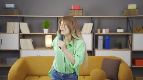 Woman Dancing and Singing with Hairbrush at Home