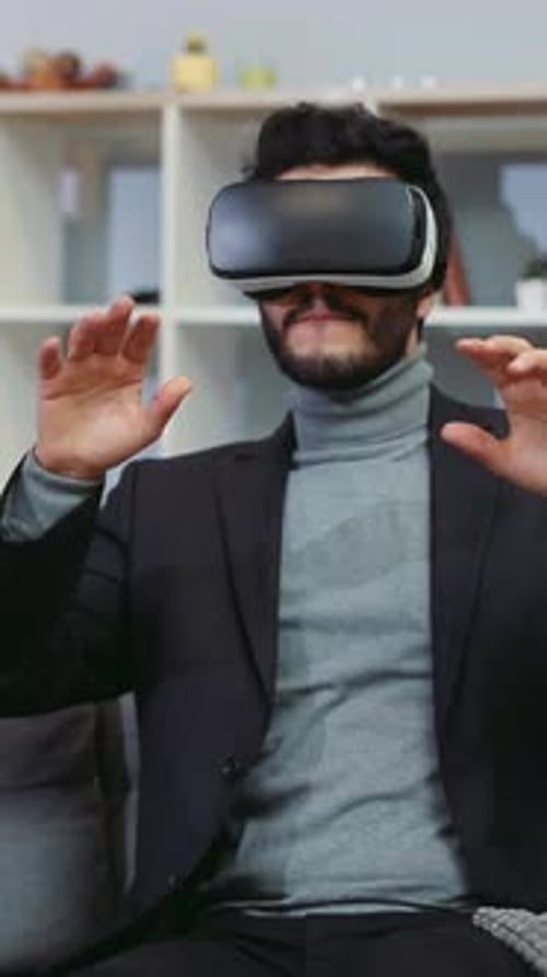 Man Experiences Virtual Reality with VR Headset