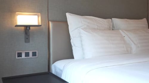 Modern Hotel Room with Clean Bed and Decor