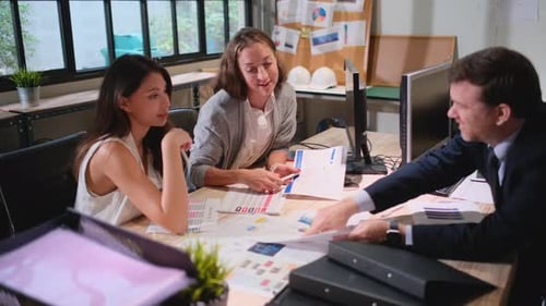 Collaborative Team Meeting in Modern Office