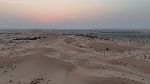 Aerial View Of Desert Sand Dunes At Sunset In Dubai