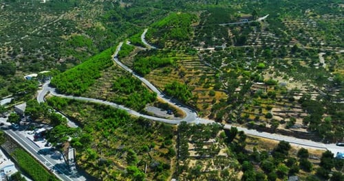 AERIAL: Traffic on a curvy mountain road in Makarska riviera, summer in Croatia
