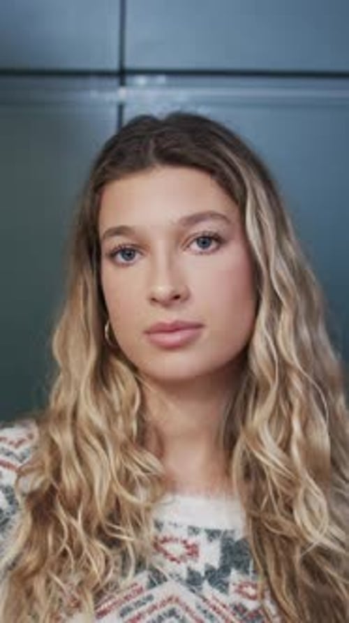 Smiling Young Woman Portrait with Blonde Curly Hair