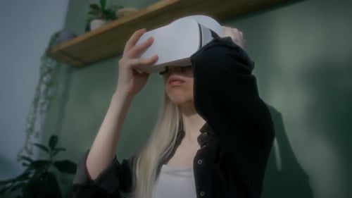 Woman Adjusting VR Headset at Home