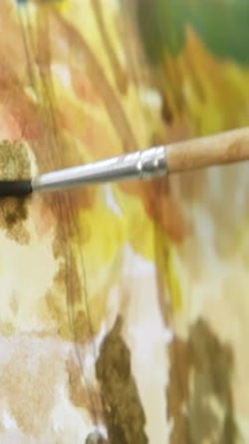 An Artistic and Creative Hand Painting of a Beautiful Landscape Created with a Brush Action