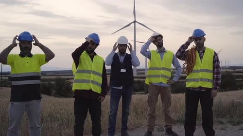 Wind Turbine Engineers Remove Hard Hats in Field
