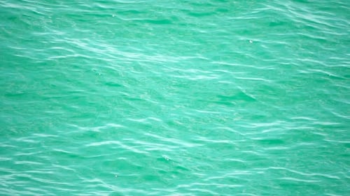 Sea Water Surface Camera Flies Over the Calm Azure Sea Nobody Holiday Recreation Concept Abstract
