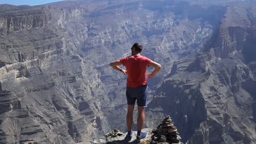 Young Man Admire Canyon View Standing on Rock, Super 240