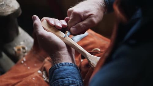 Top View of Craftsman Hand Carving Wooden Spoon