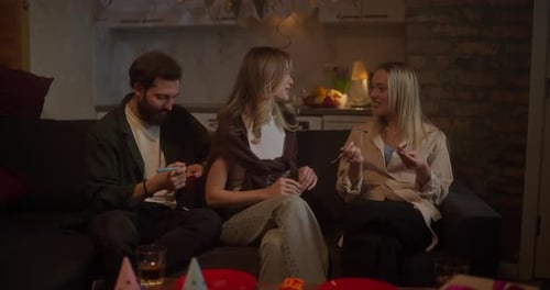 Friends Celebrating Birthday Party at Home