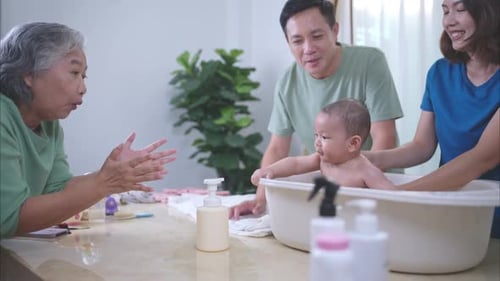 Family Enjoys Infant Bathing at Home