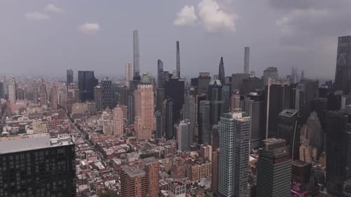 Aerial video above skyscrapers Manhattan New York skyline
