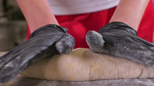 Woman rolling out dough