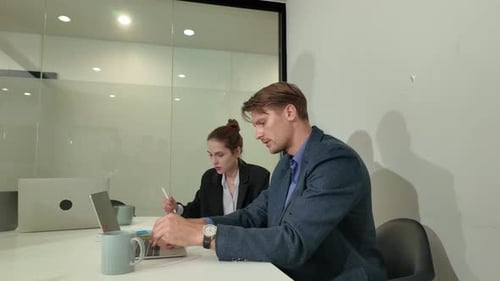 Young businesswoman talking during meeting in the office