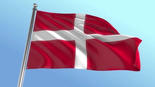 Denmark Flag Waving On Flagpole Against Blue Sky