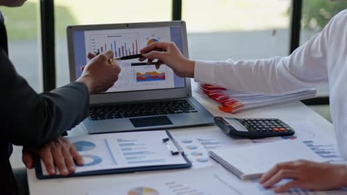 Closeup business people teamwork are working and discuss on accounting statistics, number of cost.
