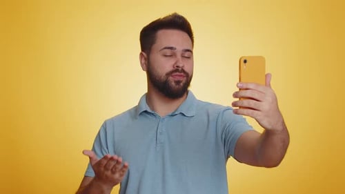 Happy Young Man Traveler Blogger Taking Selfie on Smartphone Communicating Video Call Online Stream