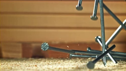 The Nails Fall on the Master's Desk Filmed on a Highspeed Camera at 1000 Fps