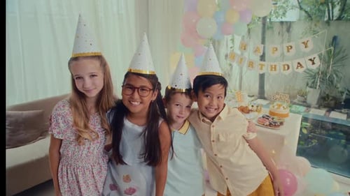 Happy Children Celebrate Birthday Party with Cake