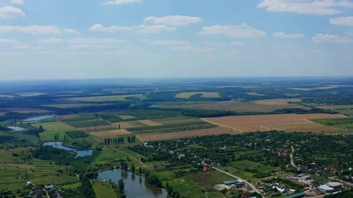 Aerial view of green countryside. Aerial view of residential area in rural town