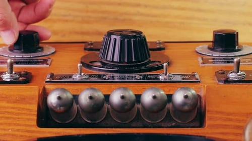 Close Up of Vintage Radio Being Tuned