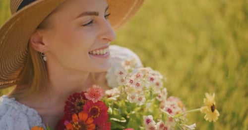 Happy Woman Holding Flowers and Rejoicing
