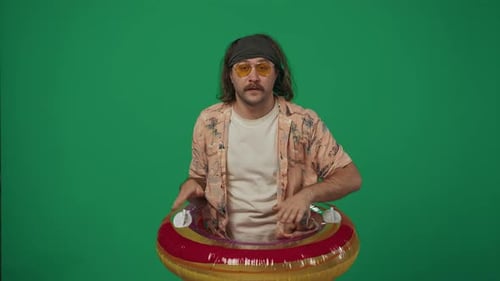 Man Wearing Swim Ring Plays Air Drums