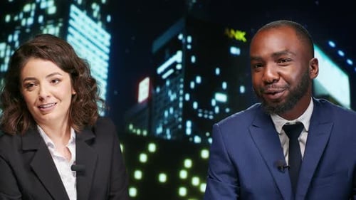 News Anchors Presenting Financial News in Modern Studio
