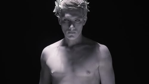 Statue of the Ancient Man Appears From the Dark Moves and Goes Back to the Dark
