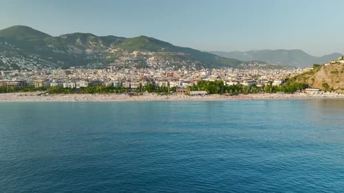 Aerial View CrystalClear Waters of the Mediterranean at a Sunny Beach Resort