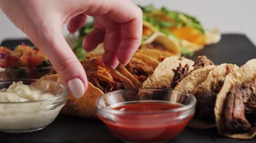 Fresh Tacos with Sauces on a Platter