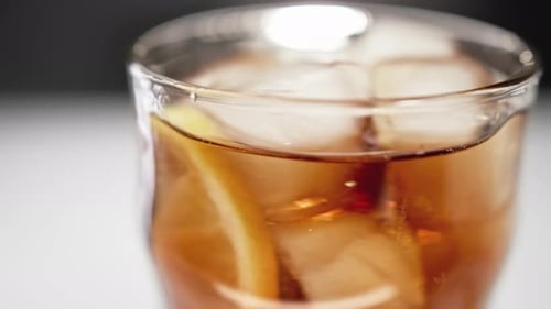 Refreshing Cold Beverage with Lemon and Ice