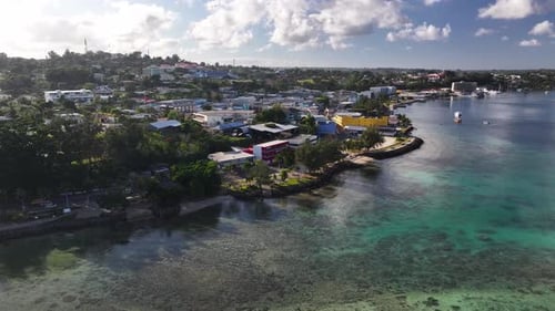 Aerial View of Scenic Coastal Town and Turquoise Tropical Waters