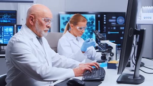 Scientists Working Diligently in a Modern Laboratory