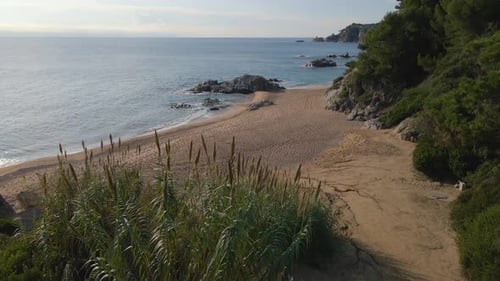 mediterranean beach paradisiaca turquoise blue waters no people aerial view drone spain catalunya co