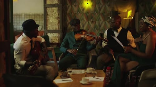 African American Jazz Band Rehearsing before Concert in Club