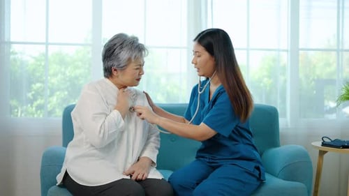 nurse and stethoscope in home for breathing test, check heartbeat and consultation. Elderly patient