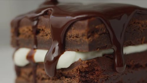 Delicious Cream Filled Brownie Cake with Chocolate Drizzle