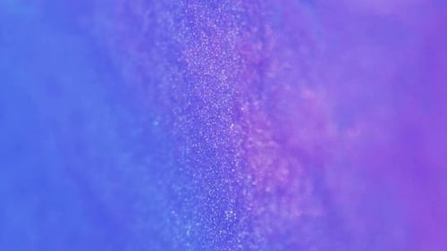 Abstract Blue and Purple Shimmering Particle Background