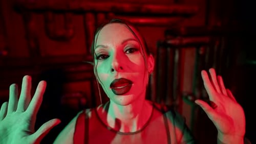 Woman Posing with Dramatic Lighting Indoors