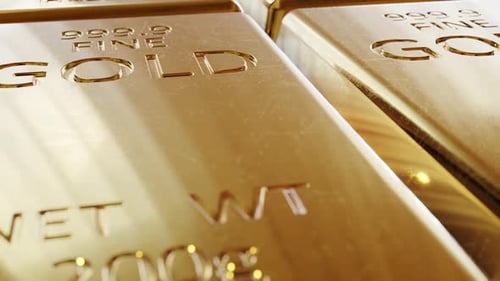 Close-up real ingots of the gold bars in the safe bank deposit box loopable
