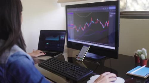 Trader business woman studying stock market investment at home. Finance and strategy concept
