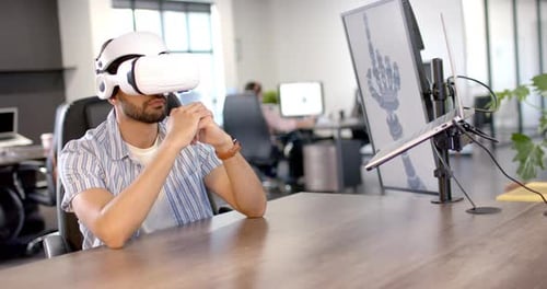 Man Using VR Headset in Modern Office