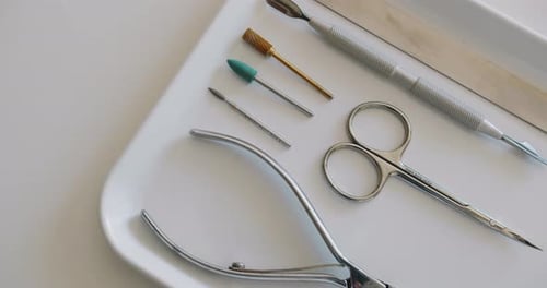 Manicure Tools on Tray in Beauty Salon Setting